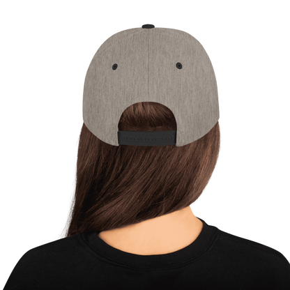 Scrambler Snapback Hat, natural heather fabric with black underside brim and back panel shape
