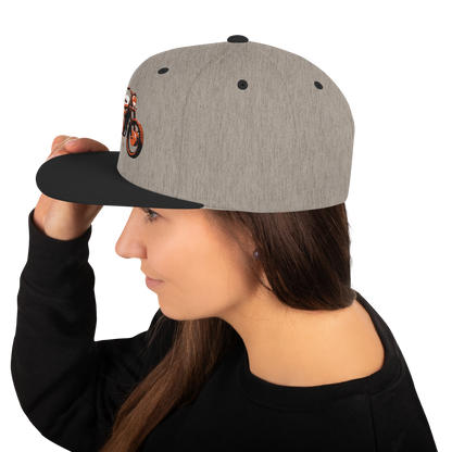 Scrambler Snapback Hat side profile, natural heather cap with small motorcycle emblem