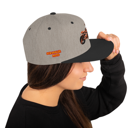 Scrambler Snapback Hat side view, natural heather with black brim and “SCRAMBLER MOTO” logo