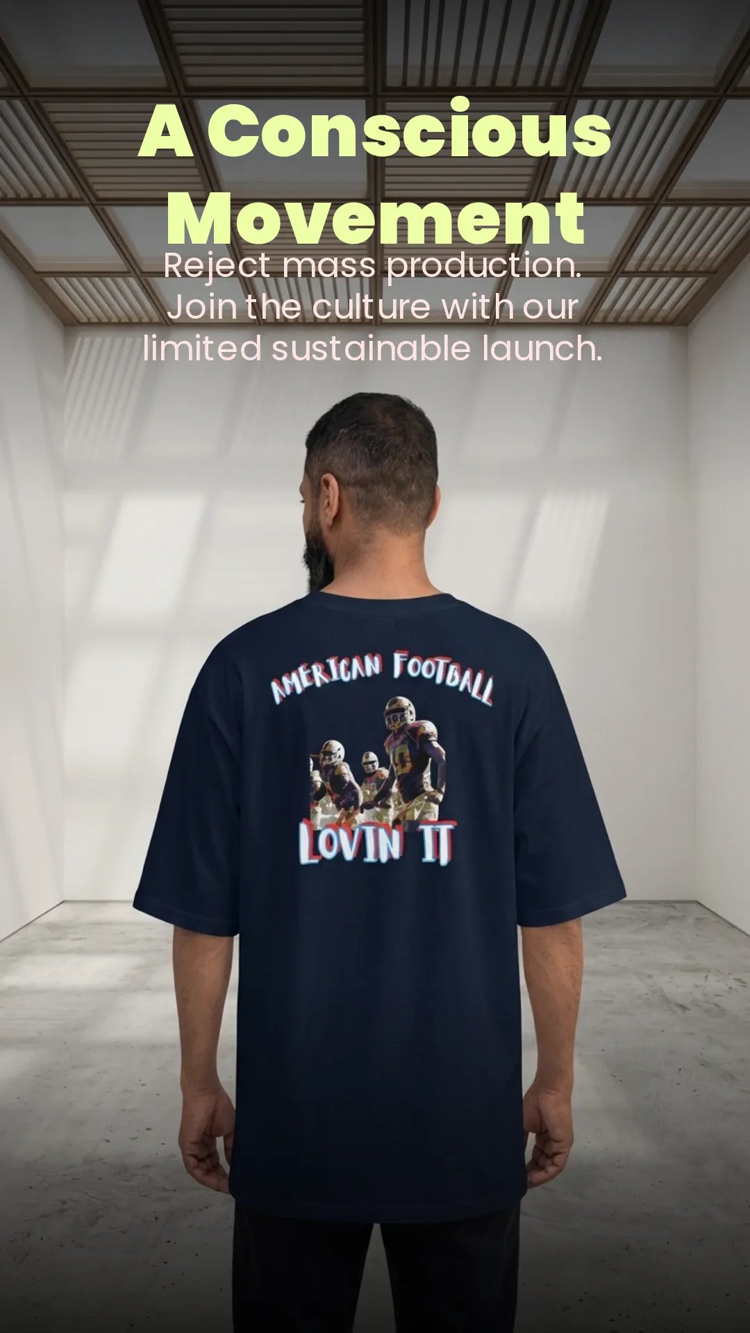 Mann trägt American Football oversized high neck t-shirt in French Navy von hinten, Kampagnenmotiv 'A Conscious Movement – Reject mass production'
