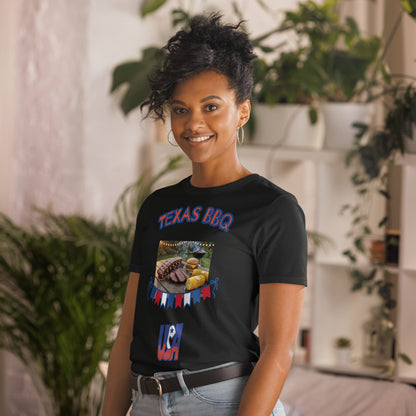 Unisex T-shirt in black with “TEXAS BBQ” print and BBQ grill food graphic on chest.