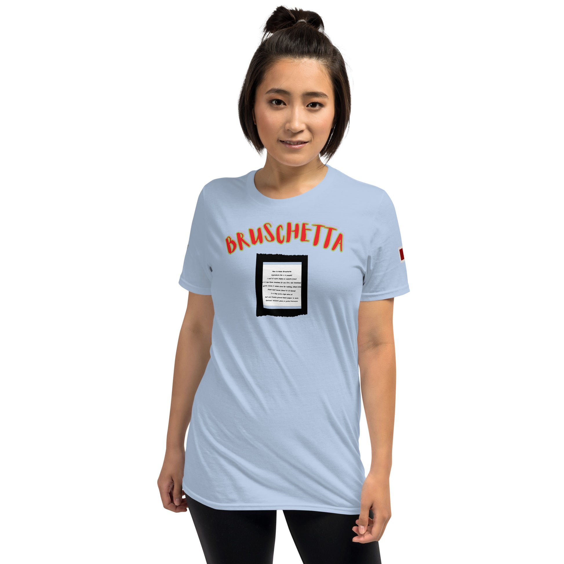 Light blue unisex T-shirt with “BRUSCHETTA” graphic and recipe square print on chest