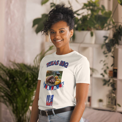 Unisex T-shirt natural color with “TEXAS BBQ” print and USA-themed BBQ graphic on front.