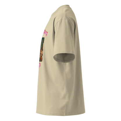 Oversized T-shirt in stone, side view with sleeve artwork detail