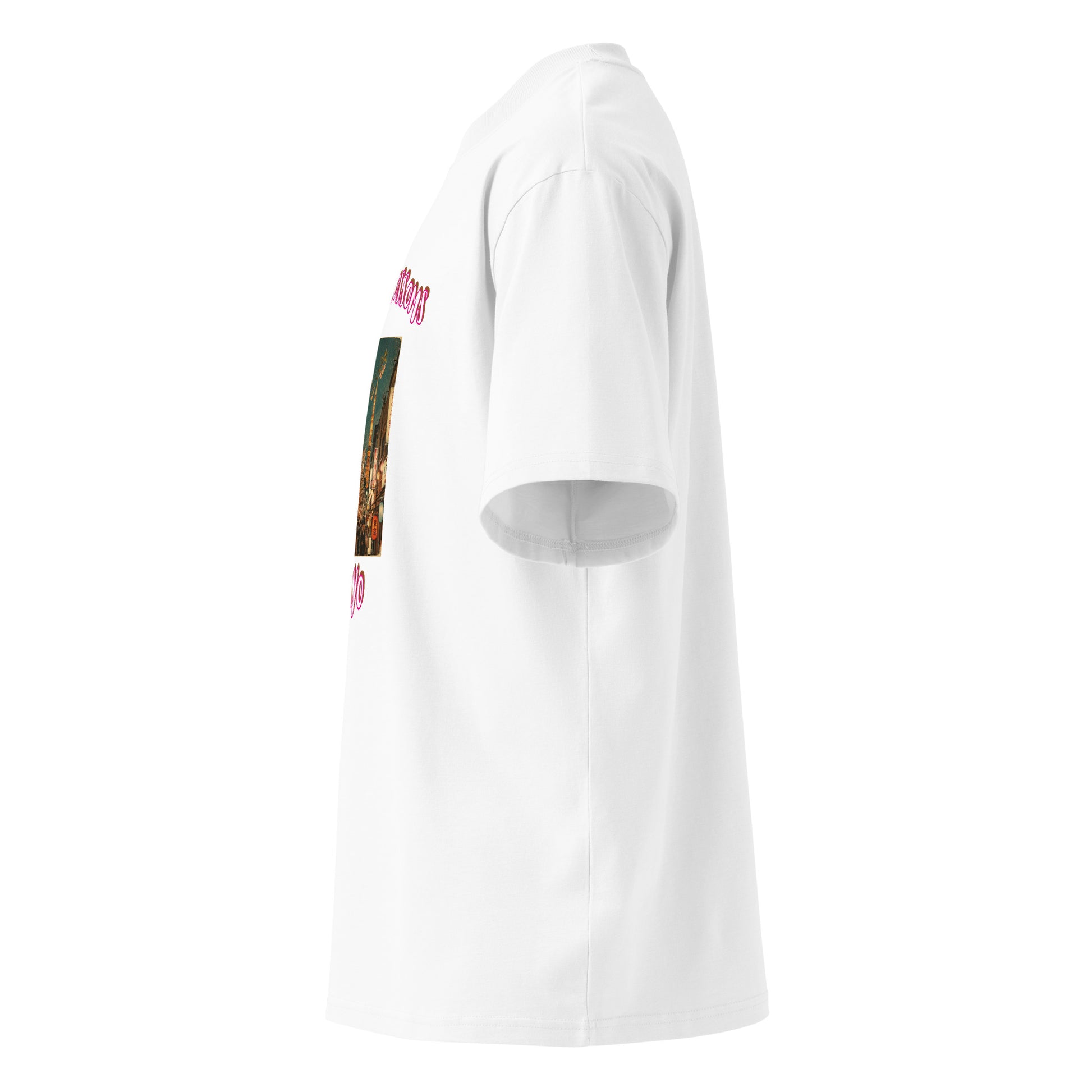 White oversized T-shirt side view showing sleeve artwork and relaxed fit