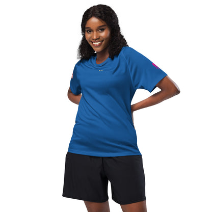Royal blue unisex sports jersey T-shirt with small chest logo and pink sleeve mark.